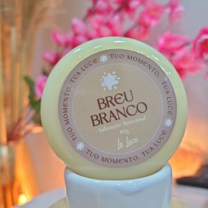 Sabonete artesanal La Luce Breu Branco, 80g, rótulo bege com ícone de respingo.